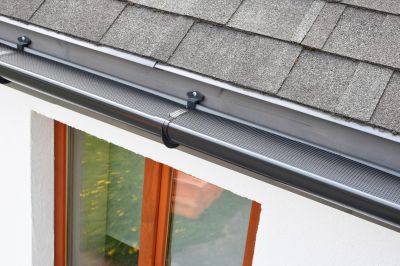 Seamless Gutter Cover Installation